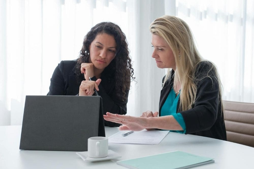 A Nashville startup founder meets with a representative of a local CPA firm to select the best payroll system for his business.